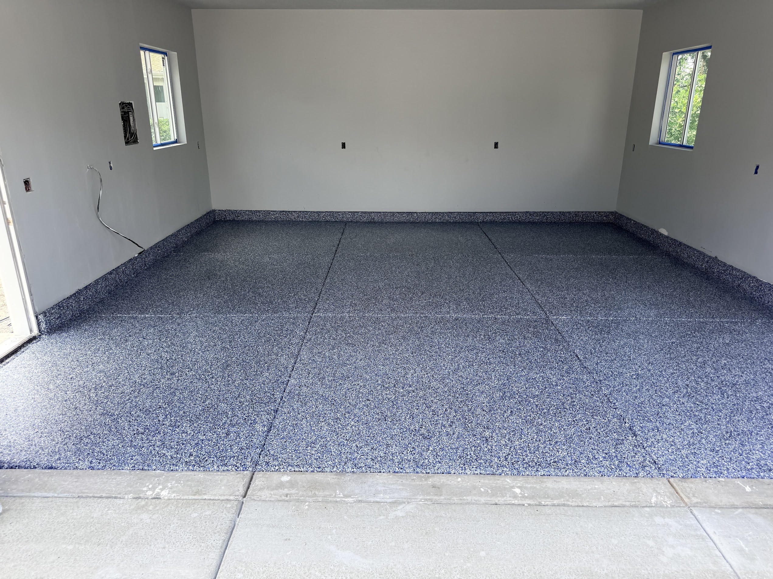 Blue flake epoxy garage floor, new construction - Utah