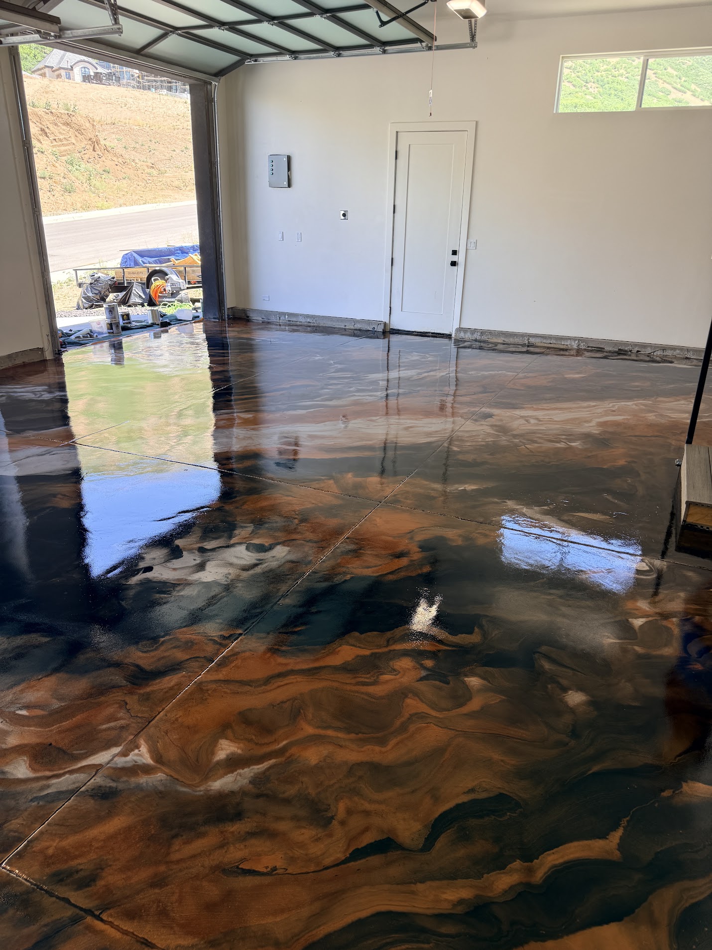 Copper and black metallic epoxy garage floor - Utah