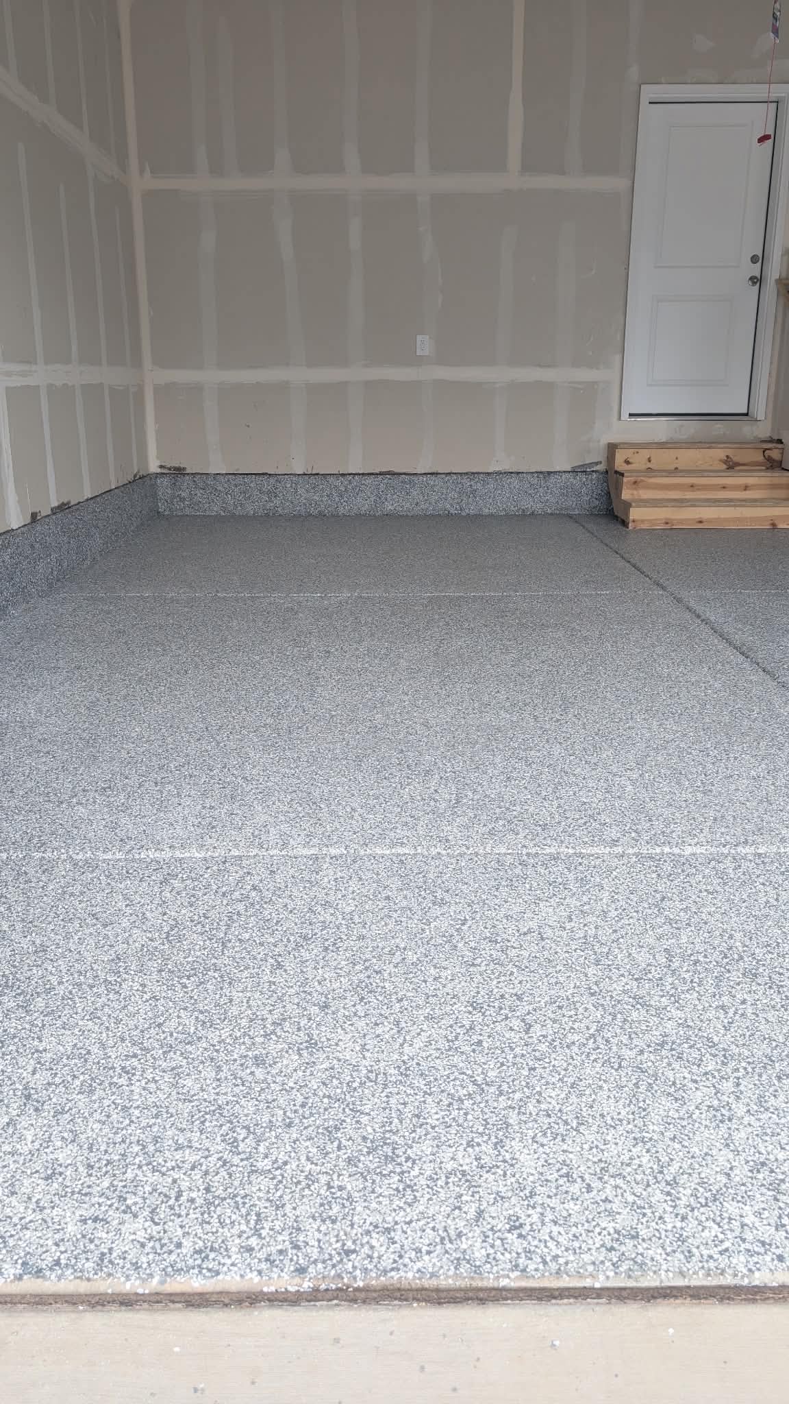 Light gray flake epoxy - new construction garage Utah